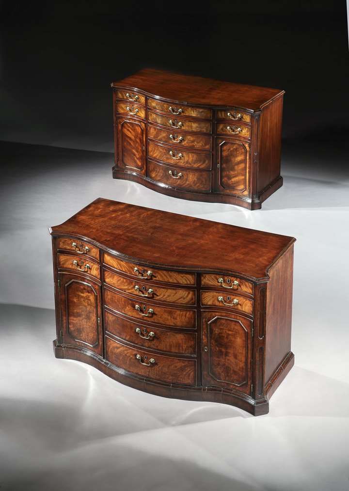 A Pair of George II Mahogany Serpentine Commodes Attributed to Wright and Elwick